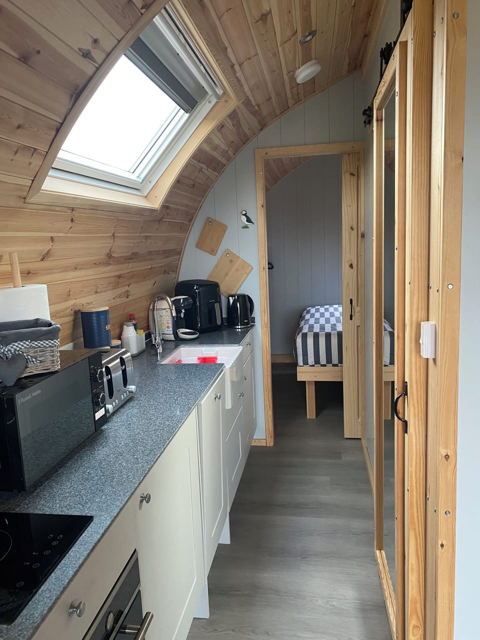 Full kitchenette, well stocked with utensils, appliances and condiments.