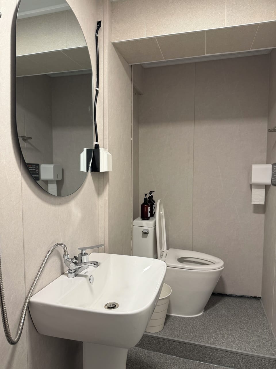 Basic Single Room (non-Korean nationals only) | Bathroom | Shower, hair dryer, slippers, towels