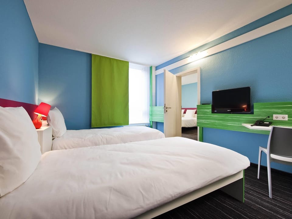 Standard Suite, 2 Double Beds, Connecting Rooms | Desk, iron/ironing board, free WiFi, bed sheets