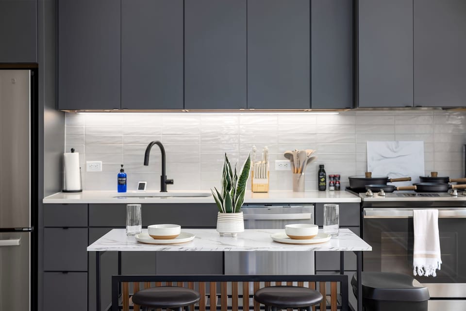  Dine in comfort—this marble-topped kitchen is equipped for your inner chef. → Want to cook here? Message us to lock in your stay!