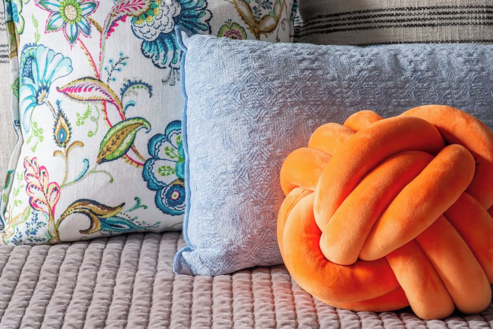 Immerse in the subtle elegance of our carefully selected bed pillows, ensuring a restful night's sleep.