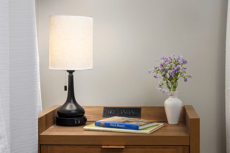 Charming lighting and classic books are scattered all throughout the home to help create your perfect home away from home. 