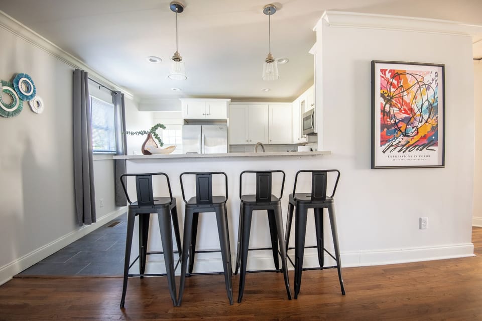 Bar-style seating at the kitchen—ideal for casual meals, morning coffee, or catching up.