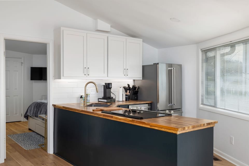 Designed openly, this beautiful kitchen ensures the chef remains part of the festivities, blending culinary art with social charm.