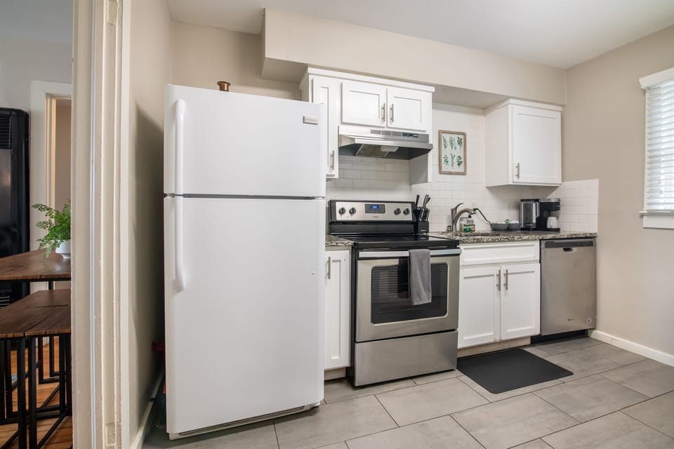 Fully equipped kitchen with modern appliances, ready for all your cooking needs.
