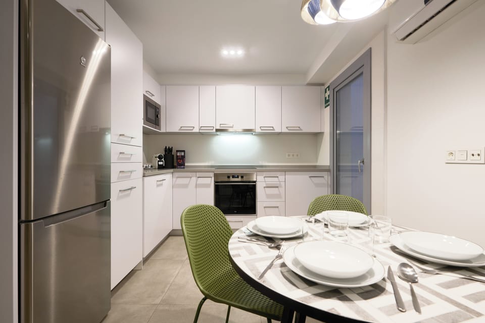 Exclusive Apartment, Kitchen, City View | Private kitchen | Full-size fridge, microwave, oven, stovetop