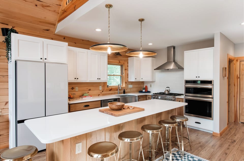 Spacious kitchen with island seating — the heart of Camp Kindred