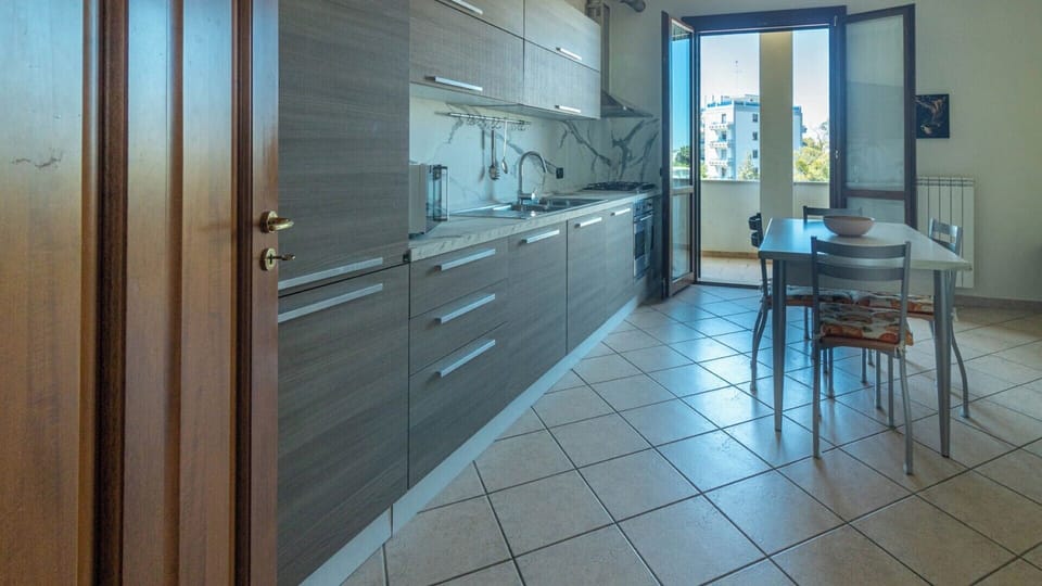Deluxe Apartment, City View | Private kitchen | Espresso maker, coffee/tea maker, electric kettle