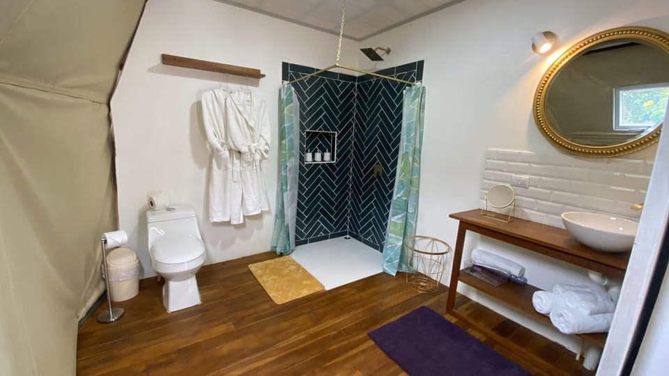 Luxury Tent, 1 King Bed with Sofa bed, Bathtub, Mountain View | Bathroom | Shower, hair dryer, bathrobes, slippers