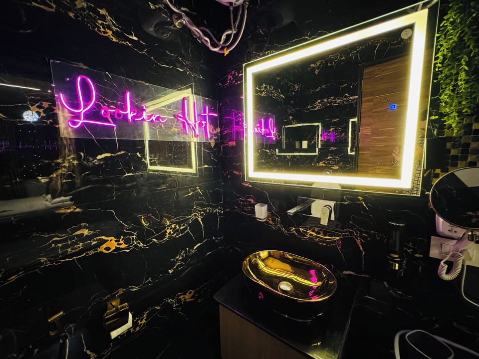 Luxury Room, 1 King Bed, Private Bathroom, City View | Bathroom | Shower, hair dryer, slippers, towels
