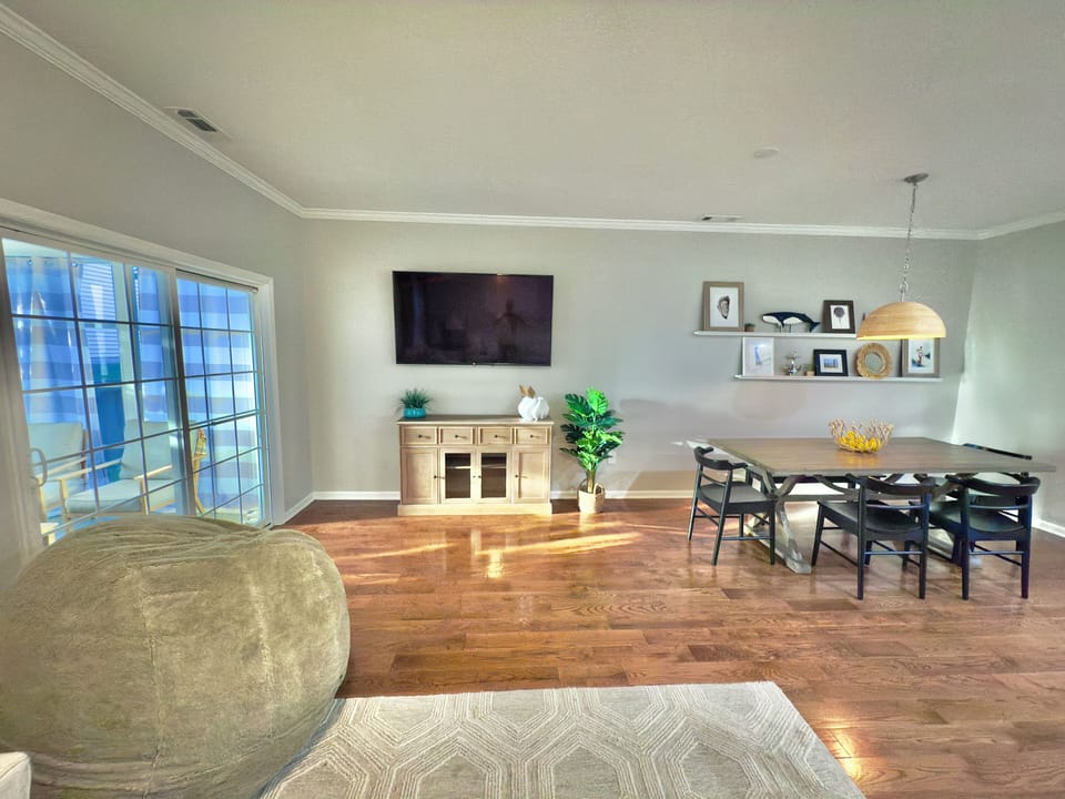 65" SmartTV and Large Kitchen/Living/Dining area perfect for entertaining.