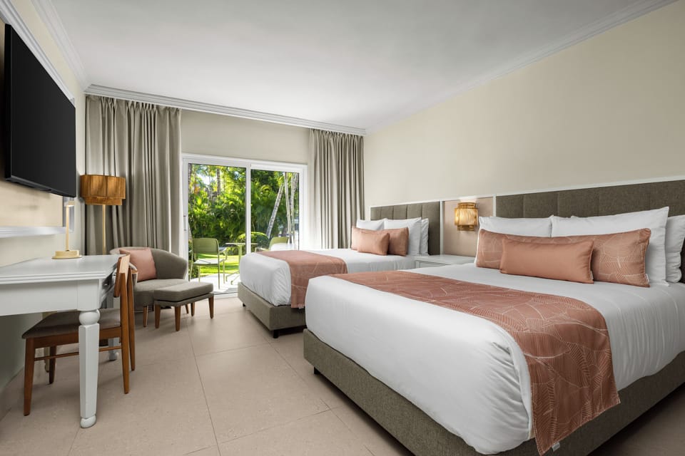 Standard Room, 2 Queen Beds (Tropical View) | Free minibar, in-room safe, desk, laptop workspace