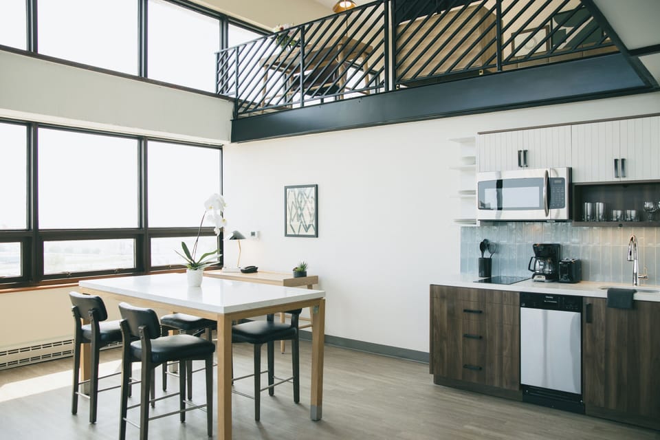 Suite, 1 Bedroom, Kitchen (Penthouse with Airport View) | Premium bedding, down comforters, desk, laptop workspace