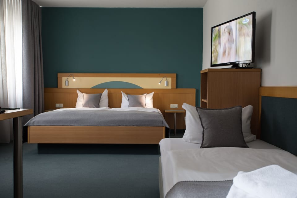 Superior Triple Room | Premium bedding, pillowtop beds, desk, blackout drapes