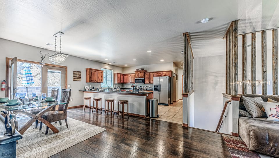 Upstairs living room open to dining and kitchen
