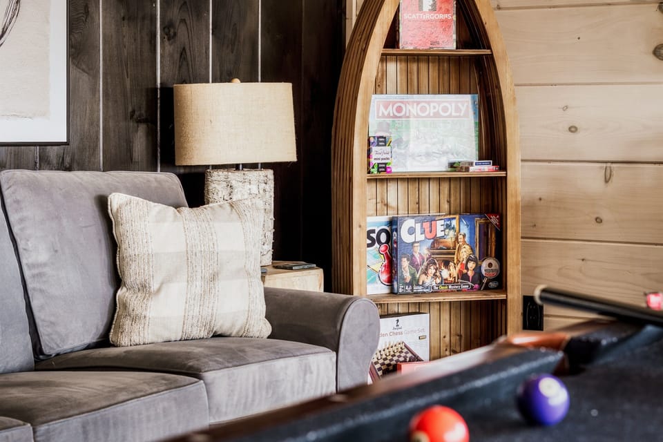 Fun-Filled Game Room – Enjoy hours of entertainment in the cabin’s game room, featuring a pool table and a comfortable lounge area. Perfect for family fun, friendly competition, or a casual hangout with friends, this space keeps everyone entertained during