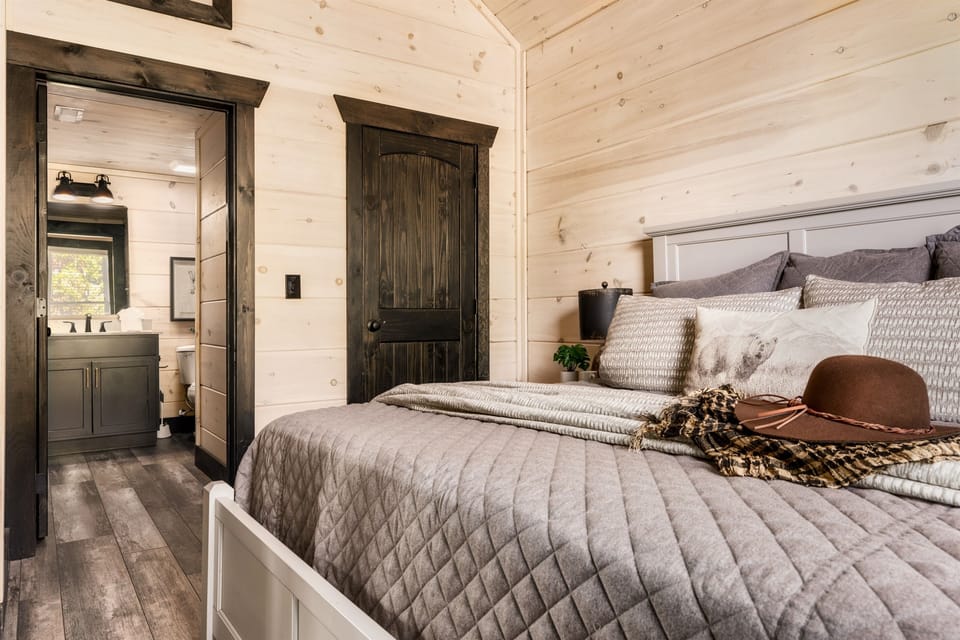 Relax in the spacious king bedroom on the upper floor, where comfort and stunning views await.