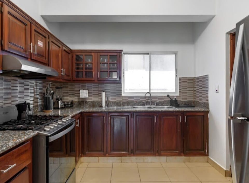 Standard Apartment, 3 Bedrooms, City View | Private kitchen | Fridge, microwave, oven, stovetop