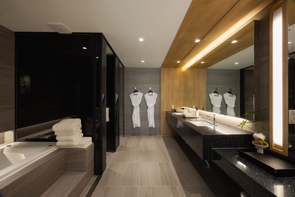 Suite, Golf View | Bathroom | Hair dryer, slippers, towels, soap