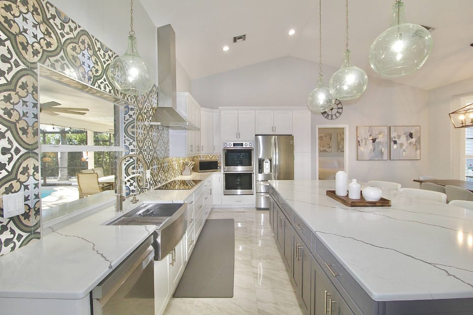 The Gorgeous Kitchen boasts Quartz counter tops, Stainless Steel appliances, Stainless Steel Range Hood, Farm Sink and Dual Wall Ovens.