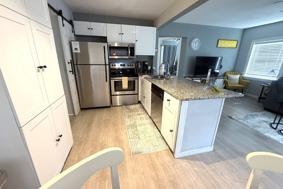 Cook up something special in the fully-equipped kitchen, complete with modern appliances, ample counter space