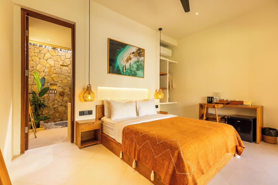 Exclusive Bungalow, Pool View | Minibar, blackout drapes, WiFi (free), bed sheets