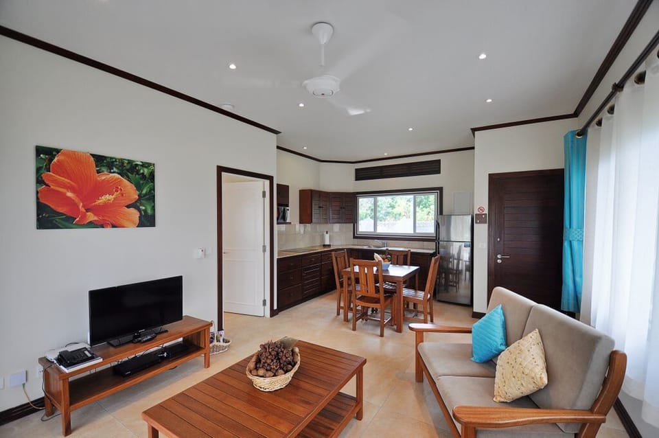 Luxury Chalet, 1 Bedroom, Beach View | Living area | 32-inch flat-screen TV with cable channels, TV