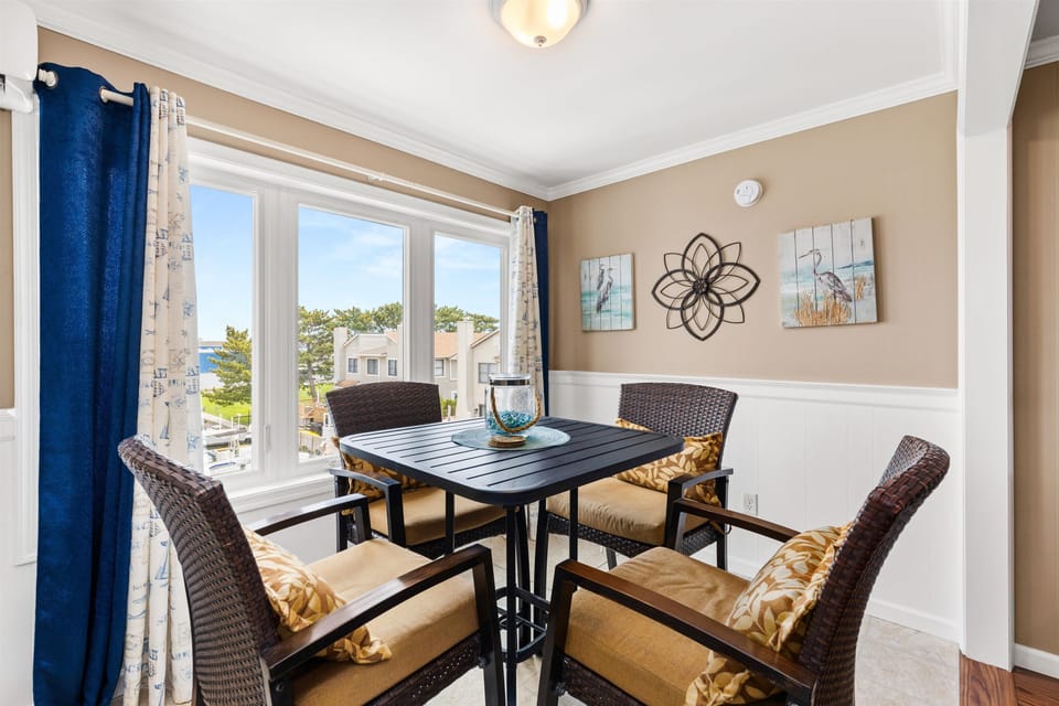 Enjoy meals together at the dining table with peaceful canal views that cannot be beat.