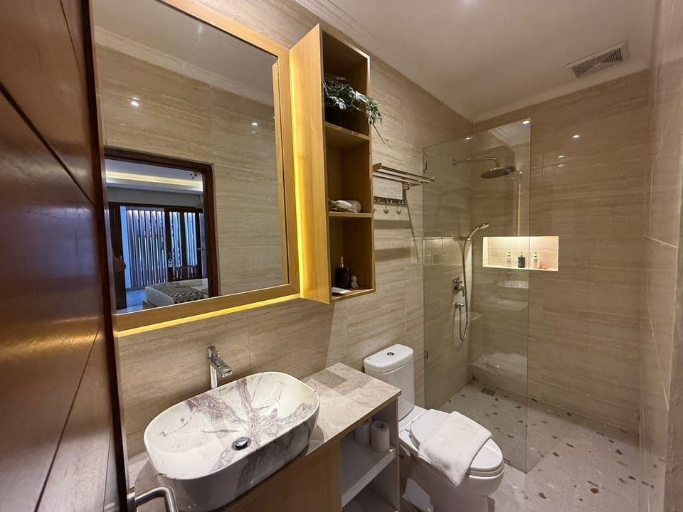 Shower, rainfall showerhead, eco-friendly toiletries, hair dryer