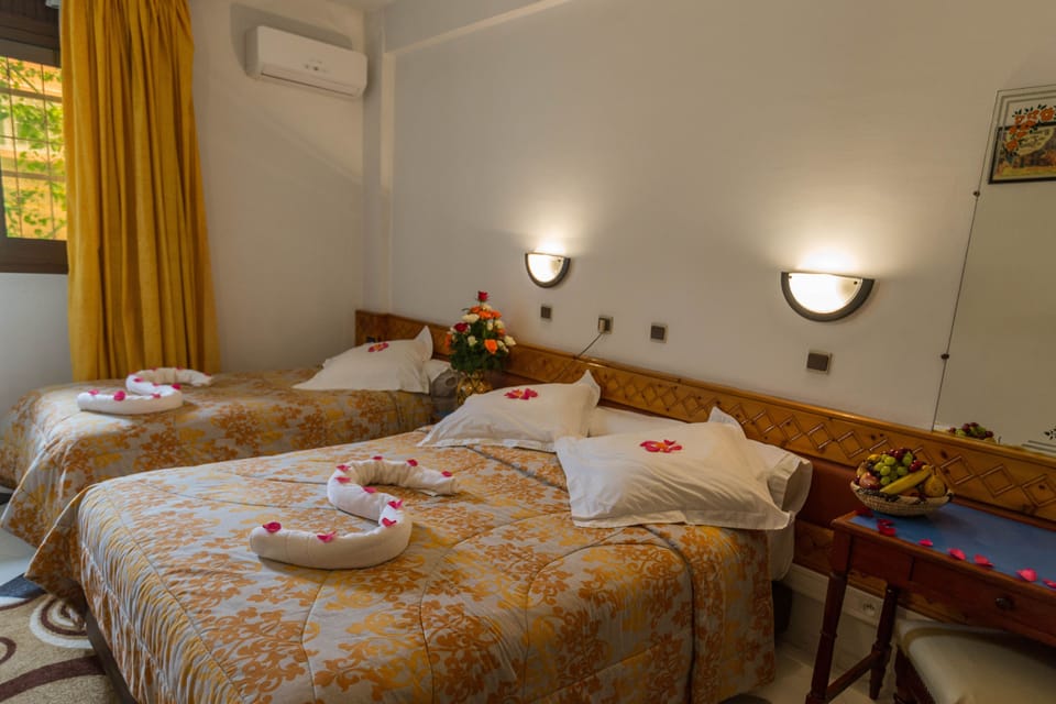 Double Room, Garden View | In-room safe, desk, iron/ironing board, free WiFi