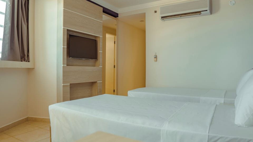 Standard Room, 2 Twin Beds | Desk, laptop workspace, blackout drapes, iron/ironing board