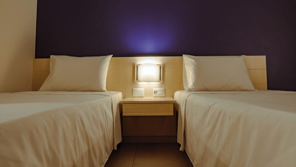 Standard Room, 2 Twin Beds | Desk, laptop workspace, blackout drapes, iron/ironing board