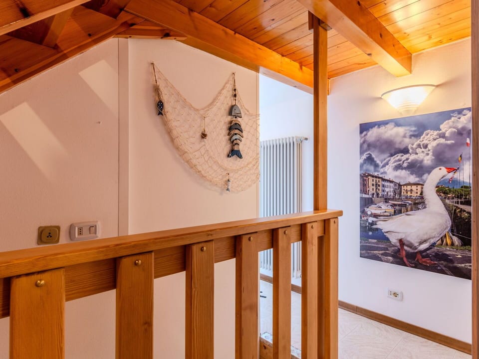 Wood, Interior Design, Flooring, Ceiling, Floor, Lighting, Room, Wood Stain, Hardwood, Door