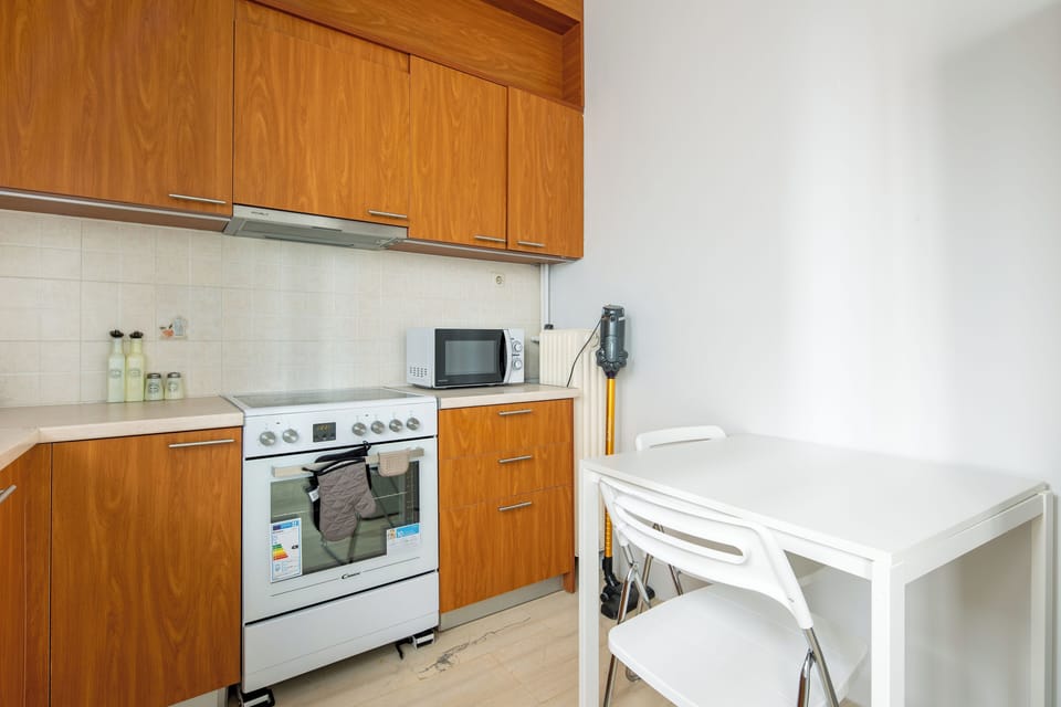 Apartment, 2 Bedrooms, Balcony, City View | Private kitchen | Full-size fridge, microwave, oven, stovetop