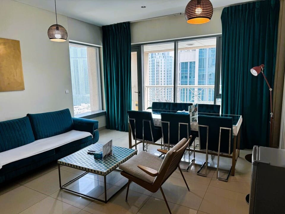 Apartment, Balcony, City View | Living area | Flat-screen TV