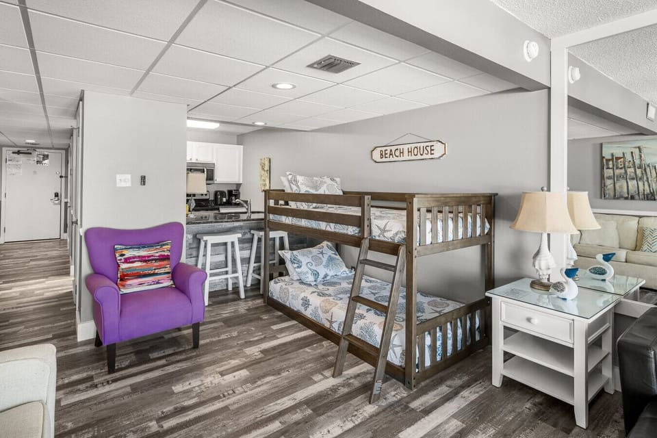 The living room also includes a Twin-over-Twin bunk set that is perfect for kids of all ages.