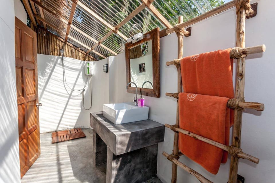 Superior Beach Front Bungalow | Bathroom shower