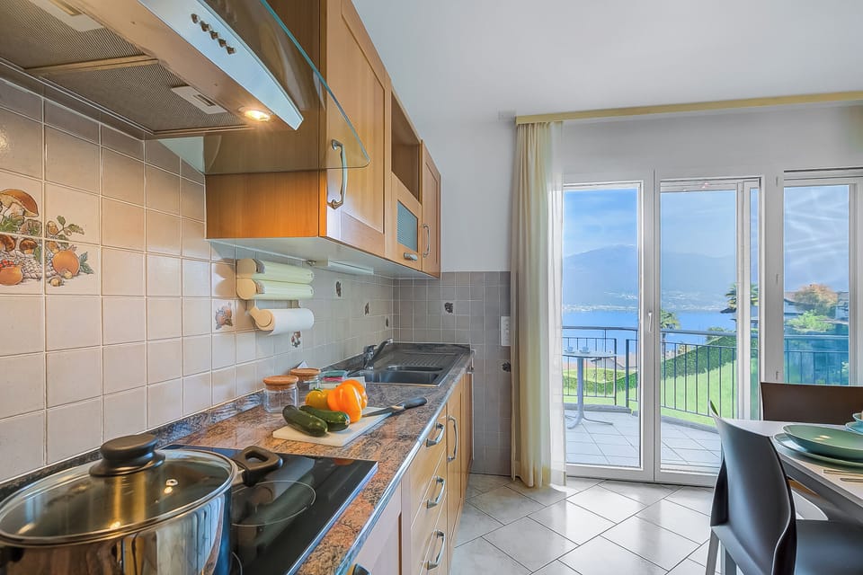 Family Villa, 2 Bedrooms, Terrace, Mountainside (Casa Zaira 1 - Caviano Gambarogno) | Private kitchen | Fridge, oven, stovetop, dishwasher