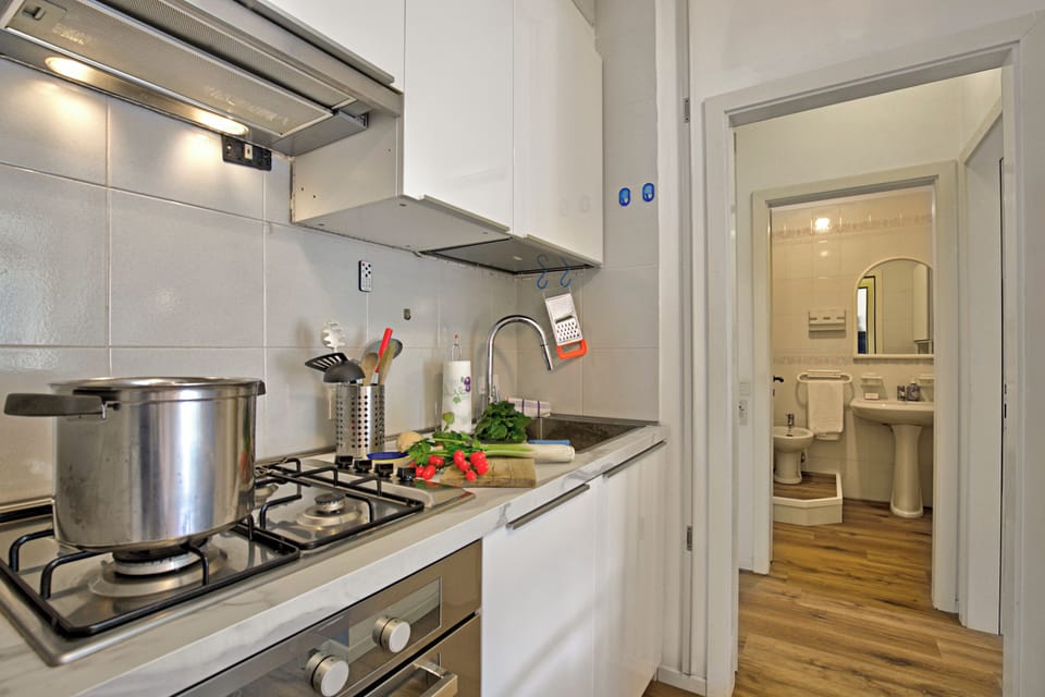 Family Apartment, Multiple Bedrooms (Garden & Surf Residenza By Max) | Private kitchen | Fridge, oven, stovetop, dishwasher