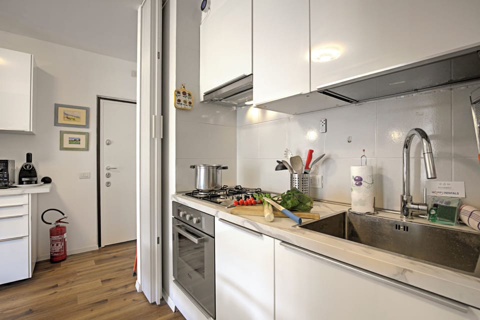 Family Apartment, Multiple Bedrooms (Garden & Surf Residenza By Max) | Private kitchen | Fridge, oven, stovetop, dishwasher