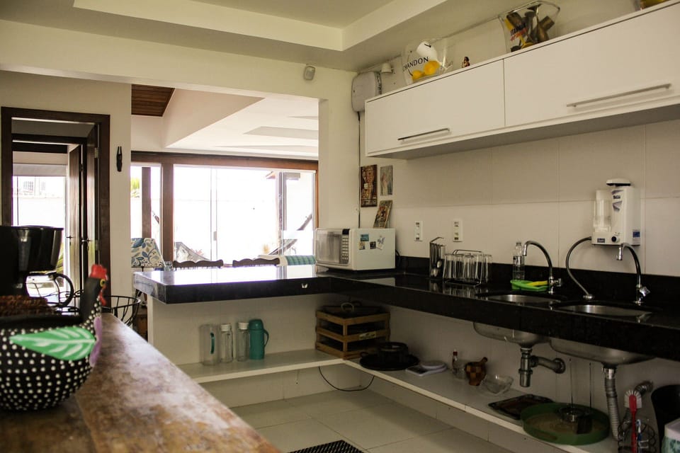 Villa | Private kitchen | Fridge, microwave, oven, stovetop