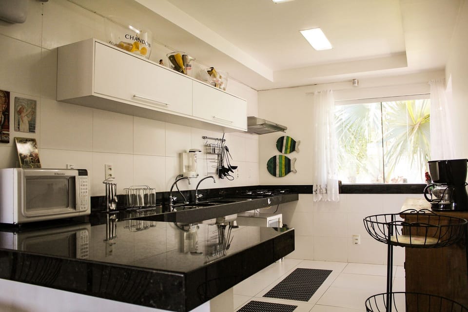 Villa | Private kitchen | Fridge, microwave, oven, stovetop