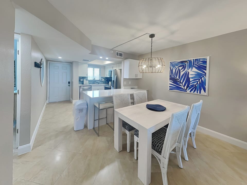 Dining Area with Seating for Four + Breakfast Bar with Seating for Two