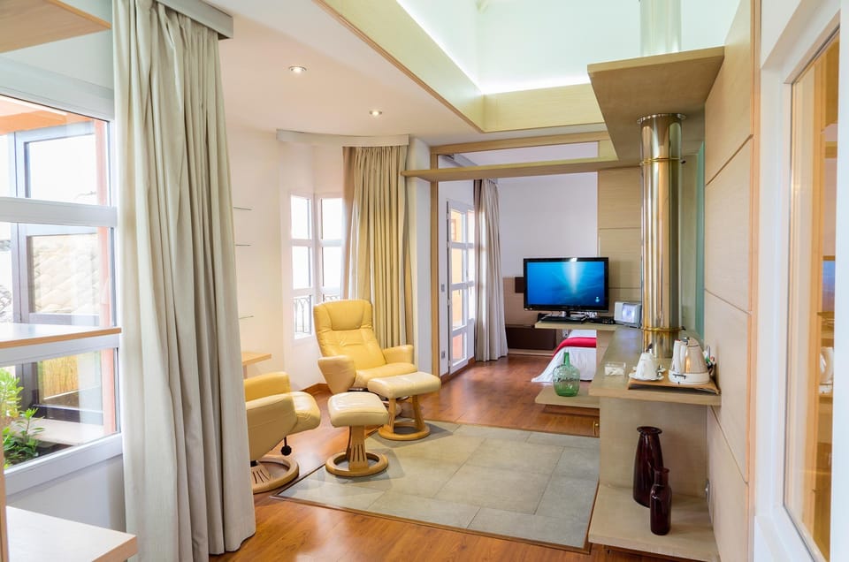 Suite | Down comforters, memory foam beds, minibar, in-room safe