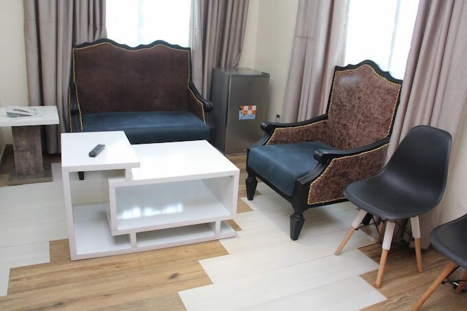 Deluxe Room, Balcony, City View | Desk, laptop workspace, blackout drapes, soundproofing