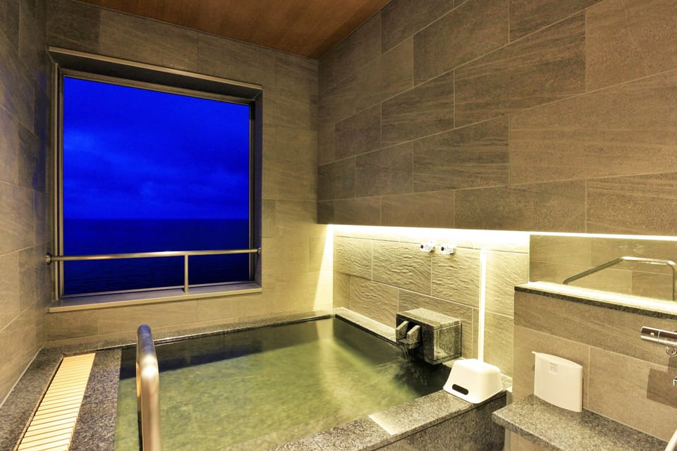 Separate tub and shower, spring water tub, free toiletries, hair dryer