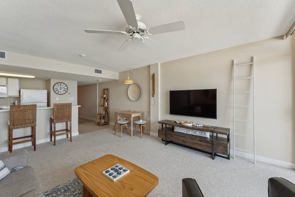 Furniture, Indoors, Living Room, Screen, Table