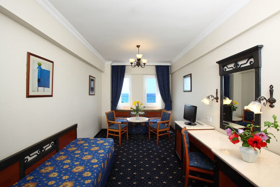 Family Room, 2 Bedrooms | Minibar, free cribs/infant beds, rollaway beds, bed sheets
