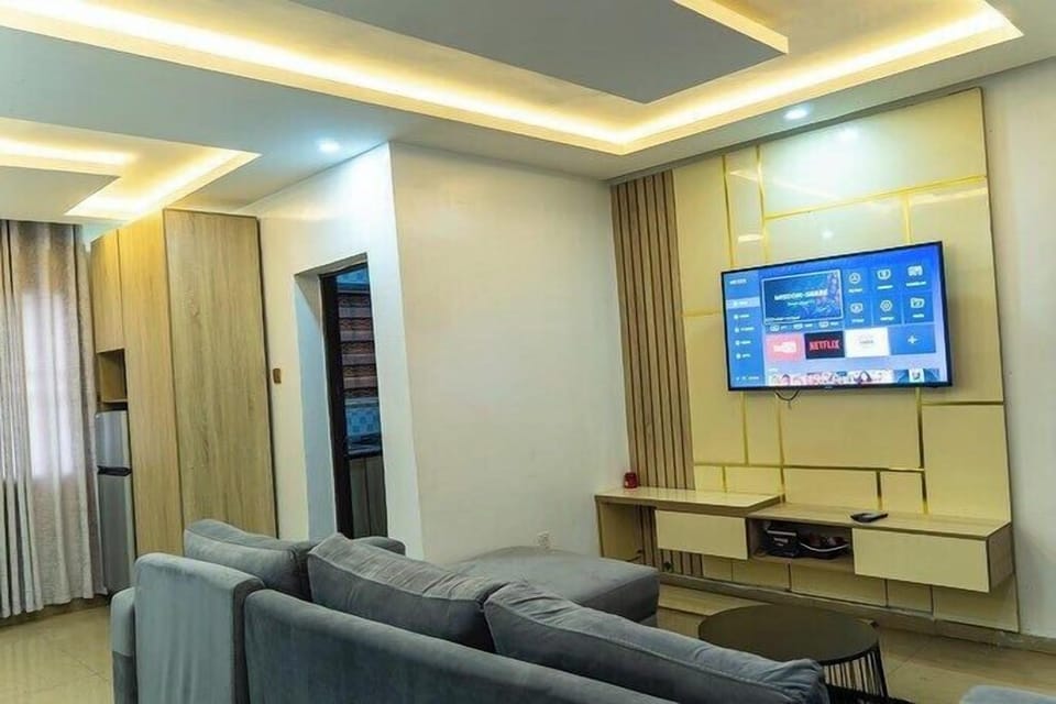 Economy Apartment, Balcony, City View | Living area | Flat-screen TV