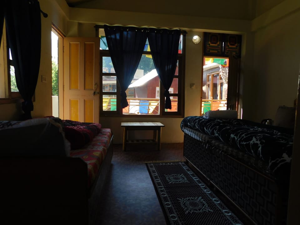Jamvant family room | Blackout drapes, iron/ironing board